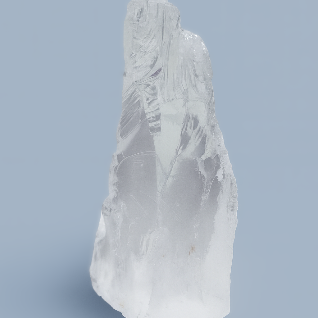 Tall clear white quartz crystal point from Tanzania